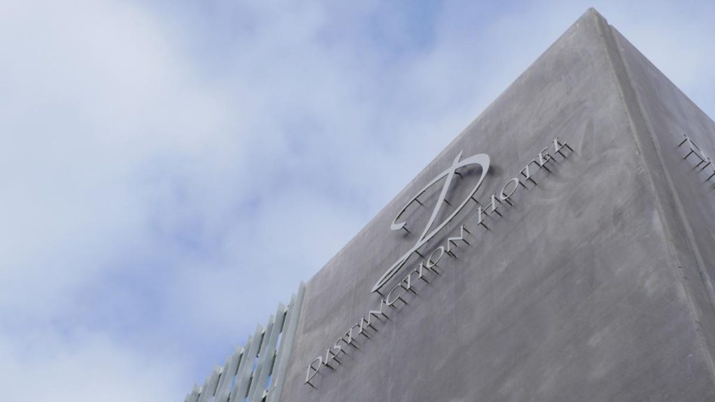 the design of the logo of Distinction Hotel